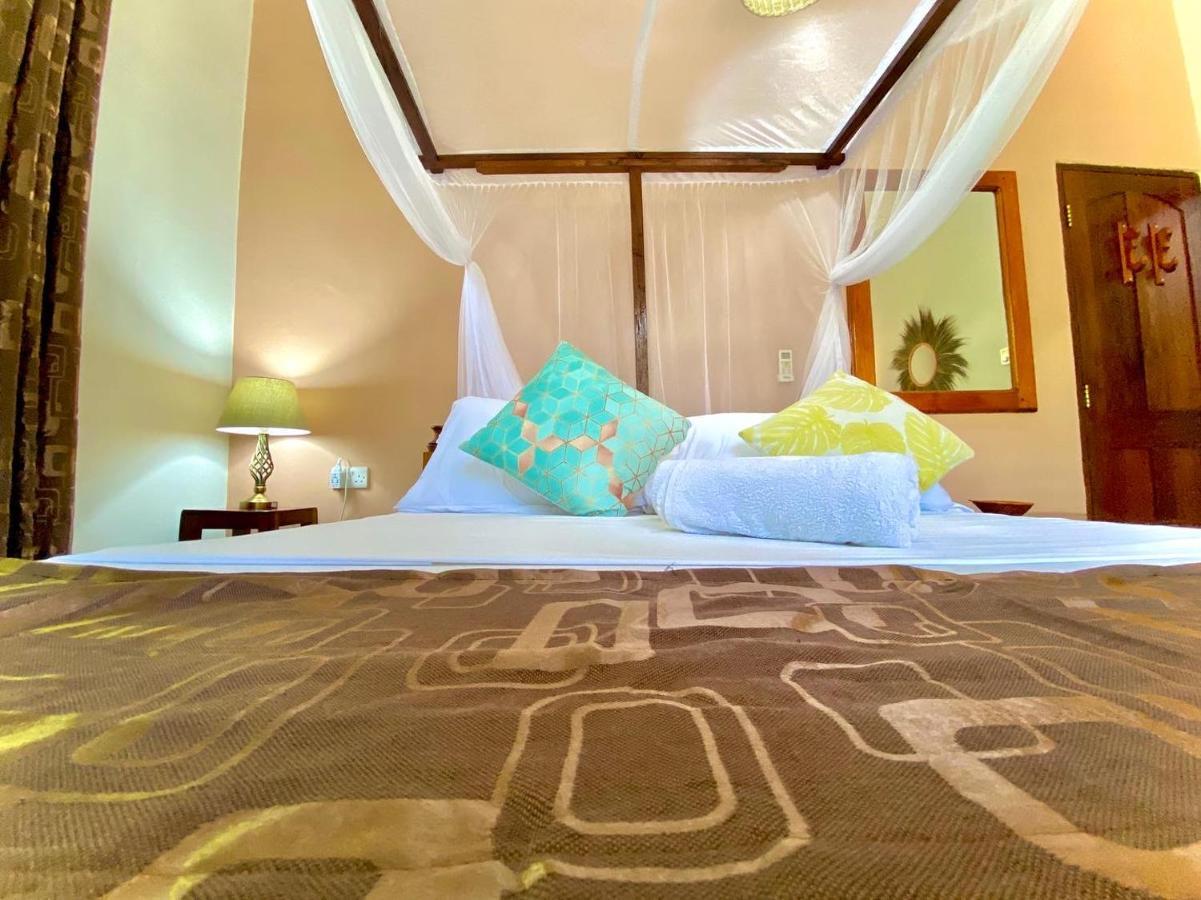 Villa Orchid Beach Guest House บูจู ภายนอก รูปภาพ