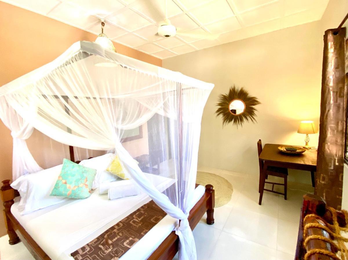 Villa Orchid Beach Guest House บูจู ภายนอก รูปภาพ