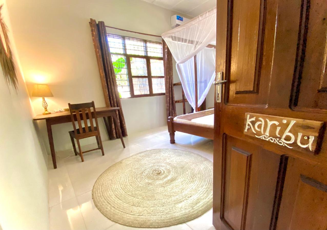 Villa Orchid Beach Guest House บูจู ภายนอก รูปภาพ