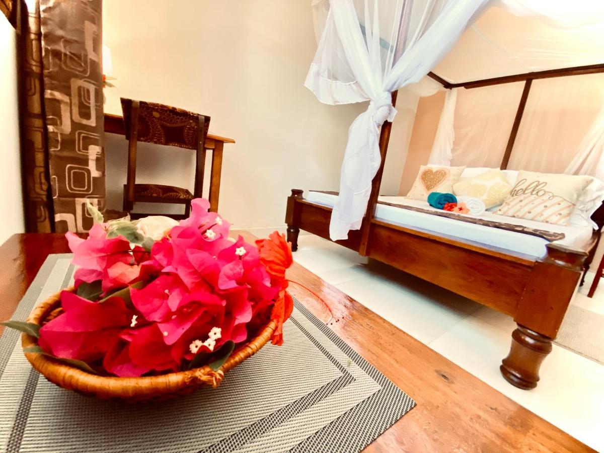 Villa Orchid Beach Guest House บูจู ภายนอก รูปภาพ